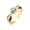 Close-up of 18K gold plated evil eye ring with black enamel and zircon details - Adjustable Open / Black (13016)
