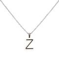 Macro detail of silver stainless steel Z letter pendant with black enamel inlay - Letter Z