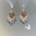 Detail of bohemian gold earrings with blue crystal teardrops and pearl beadwork - Geometric Rhombus Crystal Tassel Earrings / Gold & Blue (6#)