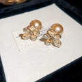 Macro detail of champagne crystal flower earrings with large satin pearl backings - Brown Petal Champagne Pearl Style (61#)