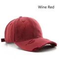 Vintage washed burgundy cotton baseball cap with distressed hole details and sun protection - Burgundy