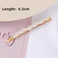 Elegant 6.5cm gold metal hair clip featuring double rows of delicate white faux pearls - Pearl Twist (3515)