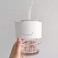 Bamboo-shaped glass coffee tumbler with white leather sleeve and straw in hand - Short Set with White Leather Sleeve (Clear)