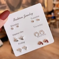 Close-up of 6-pair silver earring set with heart and floral designs on a weekly card - Ginkgo Leaf Open Ring Heart Combination (E1209-1)