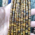 Makroaufnahme der Tigerauge-Naturstein-Abstandsperlen für DIY-Schmuckherstellung - Tigerauge