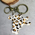 Close-up of leopard print bull head keychain with vintage brass metal buckle and chain - Leopard 1-Yellow