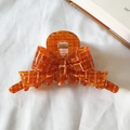 Haarklammer aus Acetat in Bernstein-Orange mit weißem Karomuster auf Stoffhintergrund - 10cm / Orange Kariert