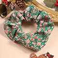Detail of Christmas themed green scrunchie with holiday patterns and festive decor - Christmas Style 1 (Green Stars & Socks)