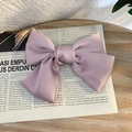 Elegant oversized dusty pink satin ribbon hair clip on vintage newspaper background - Spring Clips / Purple