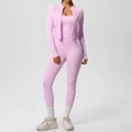 Detailed view of pink three-piece workout set including zipper jacket and yoga pants - Sakura Pink