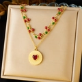 Double-layered gold necklace with cherry motif and red heart-shaped gemstone pendant - Gold Cherry