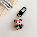 Detail van een schattige panda gewichtheffen sleutelhanger van hars met sportaccenten - Panda-Gewichtheffen