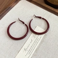 Close-up of dark red geometric hoop earrings on a minimalist wooden tray display - 4cm (Silver Needle) / Burgundy