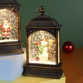 Bronzene Weihnachtslaterne mit Schneemann und funkelndem LED-Glitzereffekt - Flacher Kristall Schneemann