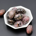 Egg shaped 30mm natural rhodonite pink and black polished gemstone stones in a white bowl - Rhodochrosite (1pc)