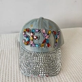 Detail of light blue denim baseball cap with SEXY crystal logo and rhinestone brim - Adjustable / Denim No.1 (Light Blue)