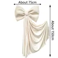 Détail d'un grand nœud décoratif crème avec des dimensions de 75 cm de large et 150 cm de long - Autres Couleurs Disponibles