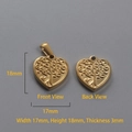 Macro detail of 18k gold heart pendant featuring tree of life engraving in 17x18mm - P00033G-Life Tree Embossed Heart