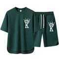 Dunkelgrünes Herren Sportbekleidungsset mit T-Shirt und Shorts mit Kronen-Logo Motiv - M / Grün