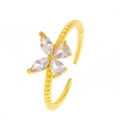 Adjustable golden ring featuring a four-petal flower set with teardrop crystals - Four-Petal Flower Style (WG-0520)