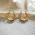 Minimalist 18K gold plated hollow round hoop earrings on beige silk and textured background - 30MM / Gold