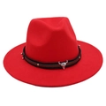 Detail of red fedora hat featuring a metal steer skull and studded brown leather belt - Red