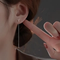 Elegant silver thread earrings with Y-shaped detail shown on model's ear - Letter Y