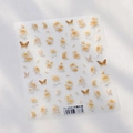 Matte nagelstickers TS-3908 met gouden herfstchrysanten en bruine vlinderpatronen - Herfstchrysant in Wind en Vorst (TS-3908)