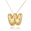 Macro shot of 18k gold plated letter W pendant with sparkling zircons on white background - Letter W