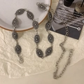Silver metal waist chain with hollow oval links and butterfly heart design details - Silver Oval Style