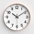Minimalist 12-inch round wall clock with rose gold metal frame and silent quartz movement - White Face Black Numbers Rose Gold Frame