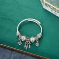 Adjustable silver dreamcatcher bangle with angel wing feathers and crystal beads - Dream Catchers