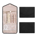 Foldable jewelry travel organizer with black quilted exterior and pink interior lining - Black