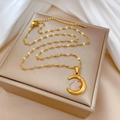 Detail of gold rabbit on crescent moon pendant displayed on a premium jewelry gift box - Gold (M419 Gold)