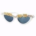 Close-up of white cat eye sunglasses with rhinestone BRIDE TO BE lettering and pearls - Metal Letter Glasses