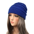 Deep blue knit beanie hat for women featuring thick textured warm ribbed patterns - Blue
