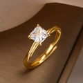 Gold plated ring featuring a square-cut zircon with a twisted band and adjustable open design - Adjustable Open / Gold
