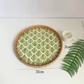 35cm round handmade rattan tray featuring a tropical green leaf print design - Plants & Flowers / Large 35*3cm
