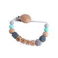 Pacifier clip with beech wood and mint green silicone beads featuring BABY lettering - Mint Green