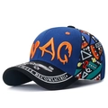 Macro detail of SWAG embroidery and ethnic geometric print on baseball cap side - Royal Blue