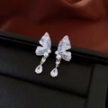 Macro detail of butterfly earrings with blue stones, pearls, and teardrop zircons - 8# Silver Pin Silver Blue Butterfly