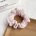 Detail of light pink floral scrunchie with bubble texture fabric on a wooden tray - 5# Light Pink Seersucker
