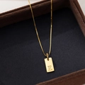 Minimalist S925 silver rectangle letter E necklace with gold finish on jewelry box - Letter E / Gold