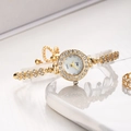 Elegant gold quartz bracelet watch for women with rhinestones and adjustable slider chain - Gold Strap White Dial