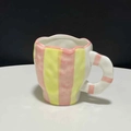 Ceramic tulip mug with pink and yellow hand-painted vertical stripes and wavy rim - Stripe Pattern