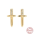 Macro detail of gold-plated 925 silver dagger earring with clear zircon stones - Gold Sword White Zirconia / 925 Silver