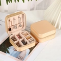 Portable champagne gold PU jewelry box with internal slots for rings and necklaces - Zipper Style / Gold