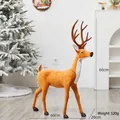 Lifelike 60cm standing Christmas reindeer decoration with brown fur and white spots - 60cm