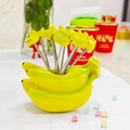 Creative banana-shaped fruit fork set with stainless steel picks and yellow holder - Banana Base + 10 Banana Forks