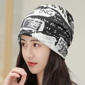 Soft beanie hat featuring trendy black and white newspaper print with graffiti text - M (56-58cm) / Black White Letter